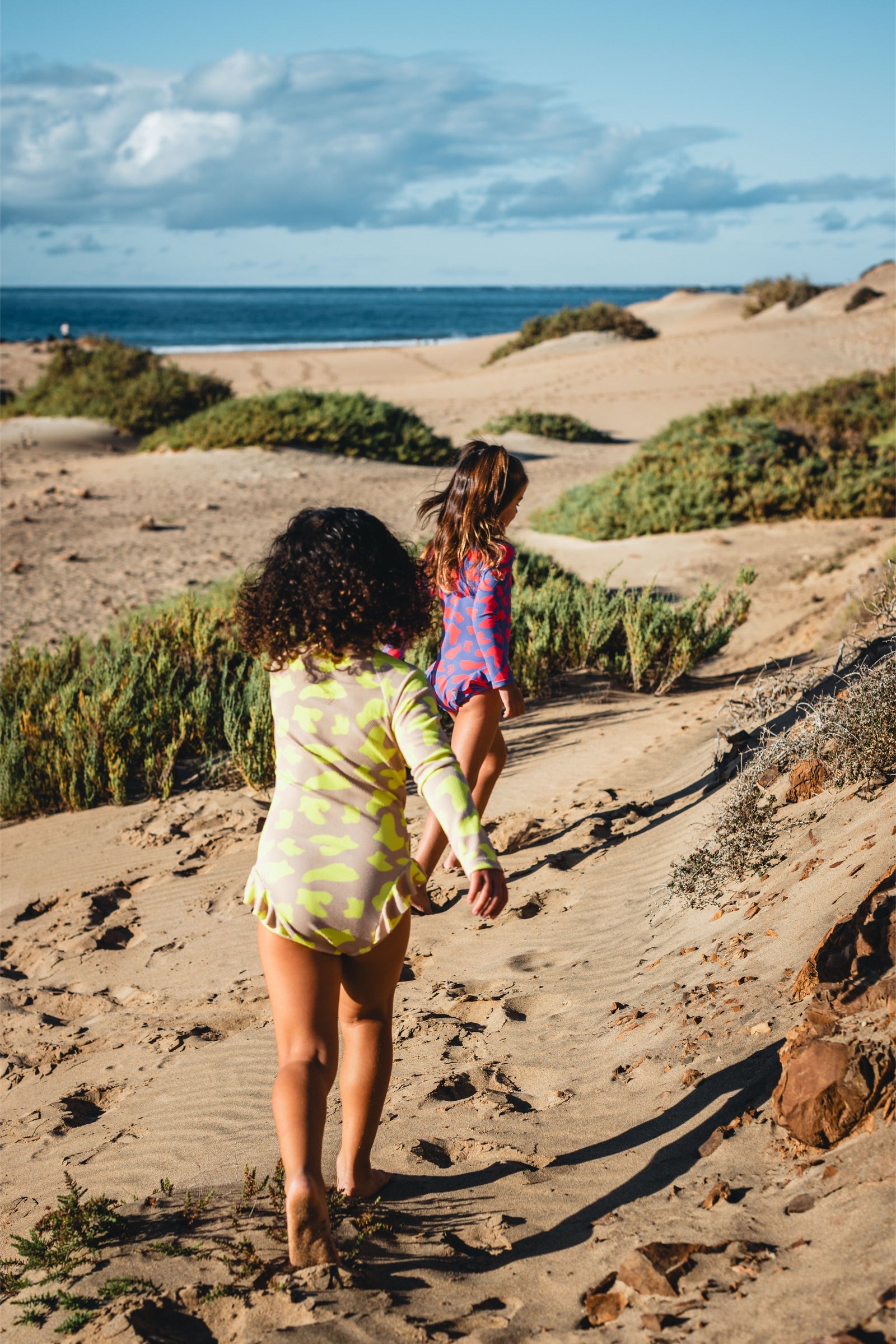 girls UV swimsuits bright colours