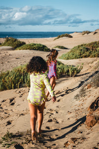 girls UV swimsuits bright colours
